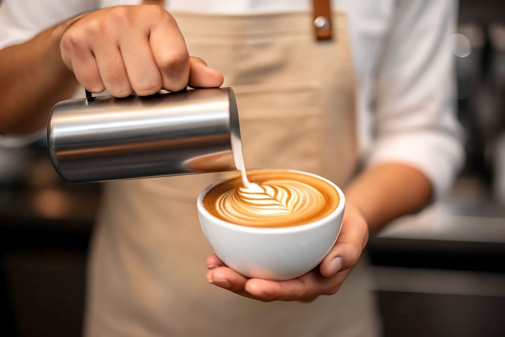vecteezy-skilled-barista-artfully-pours-steamed-milk-into-a-freshly-72505569